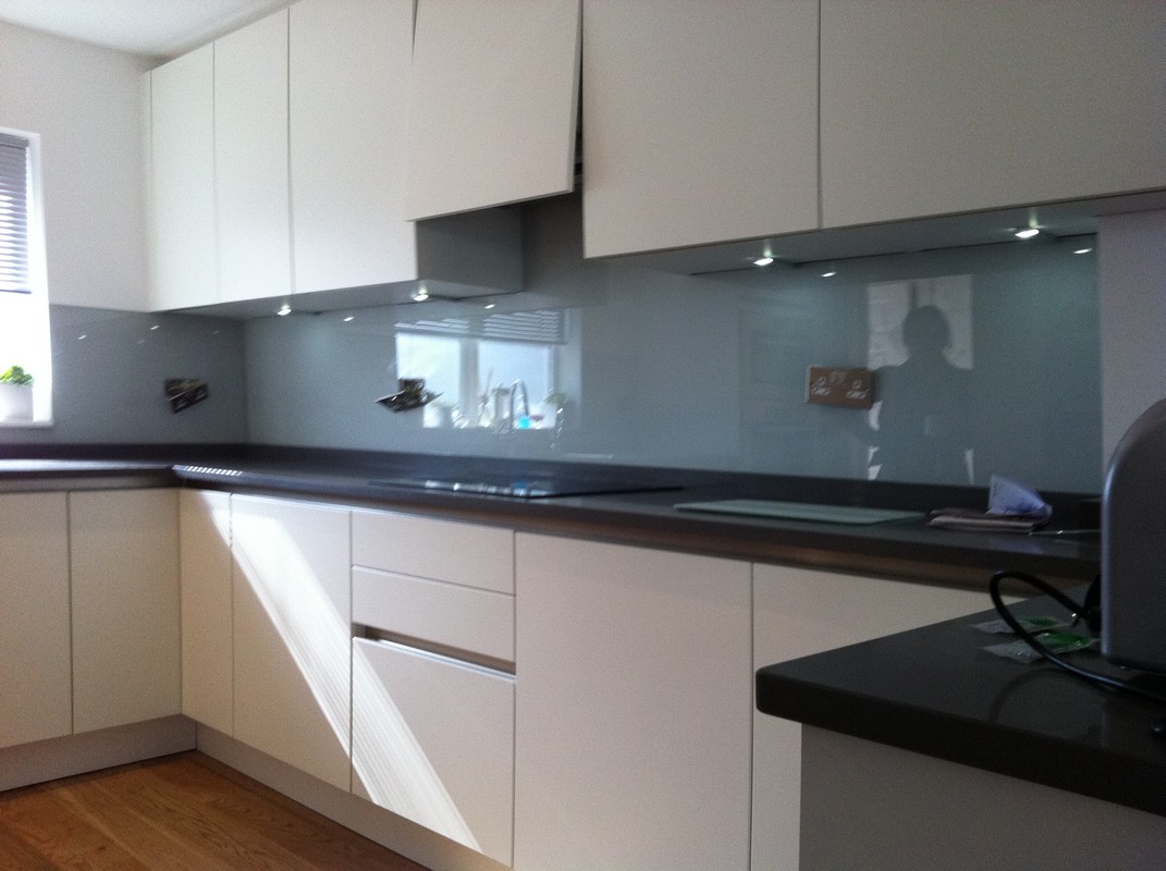 Grey glass kitchen splashback with LED lighting in Beaconsfield