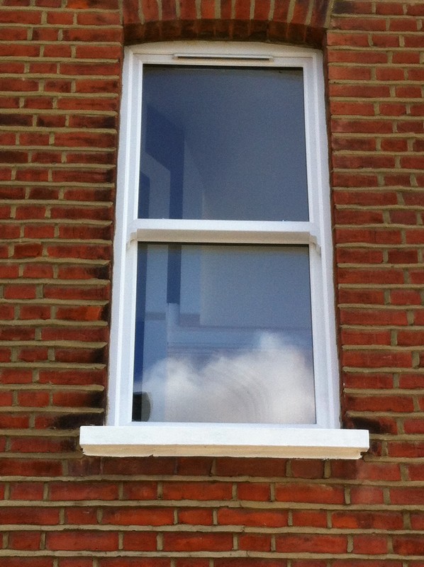 uPVC sash window on Victorian red brick house in Beaconsfield